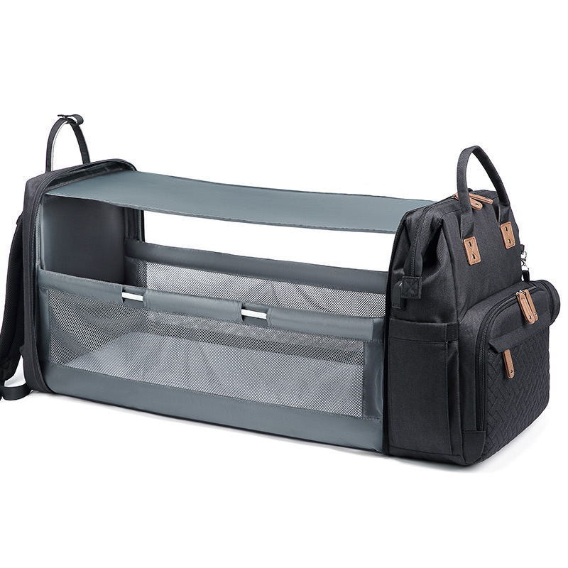 Portable folding crib mommy bag